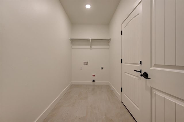 laundry room with hookup for an electric dryer and hookup for a washing machine