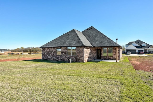 exterior space with a front lawn