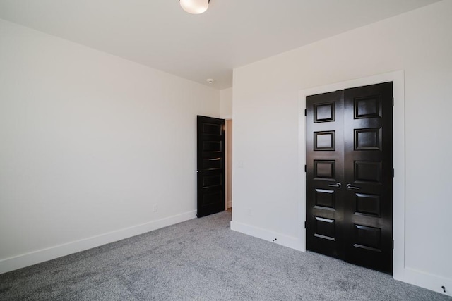 empty room with light colored carpet