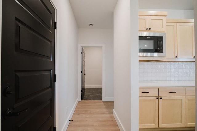 hall featuring light hardwood / wood-style flooring