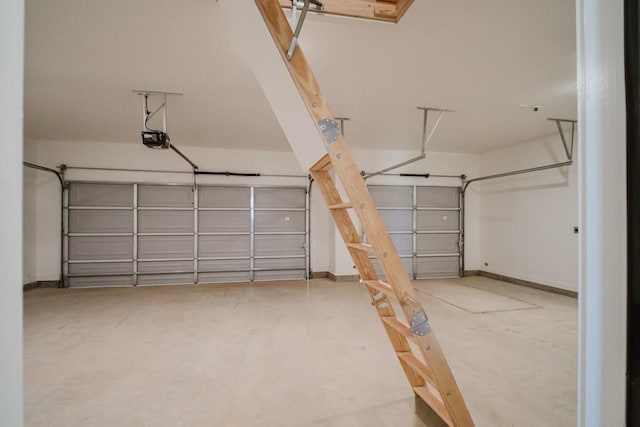 garage featuring a garage door opener