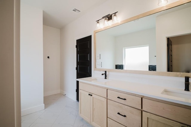 bathroom featuring vanity