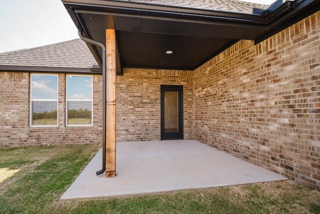 property entrance with a patio area