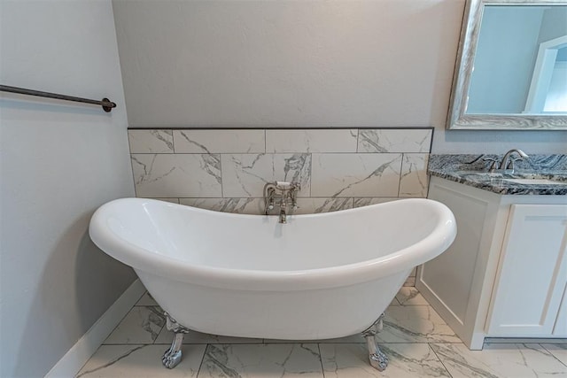 bathroom with a bathtub and vanity