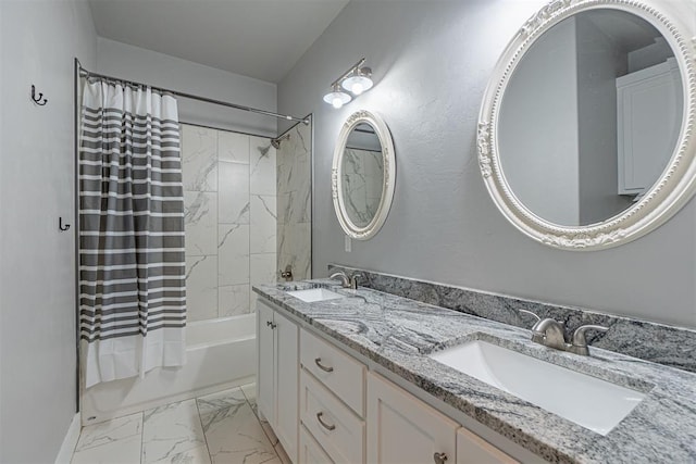 bathroom featuring vanity and shower / bathtub combination with curtain