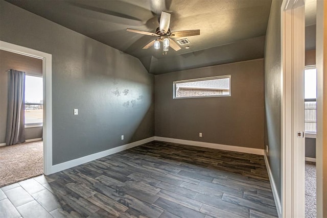 spare room featuring ceiling fan and carpet flooring