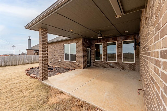 view of patio featuring ceiling fan