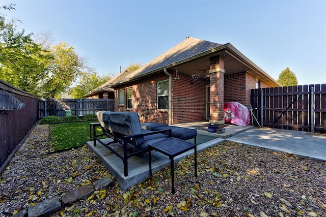 rear view of property with a patio