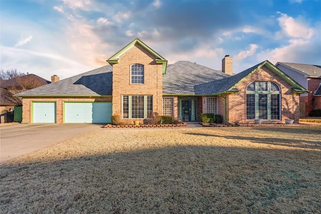 front of property with a garage