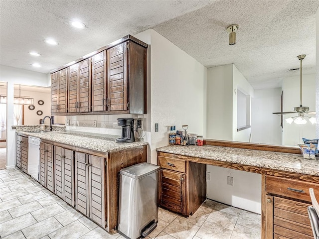 kitchen featuring ceiling fan, dishwasher, recessed lighting, a textured ceiling, and a sink