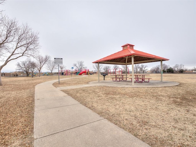 view of community with a gazebo, a yard, and a playground