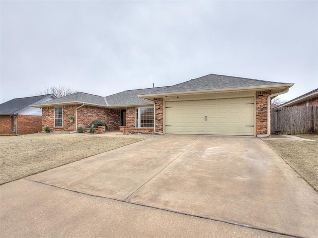 ranch-style house featuring a garage