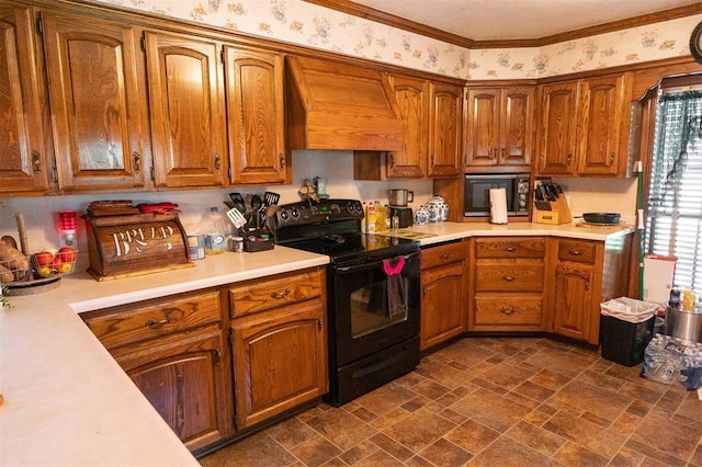 kitchen featuring black appliances, crown molding, and custom exhaust hood