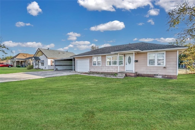 ranch-style house featuring a garage, a front lawn, and a carport