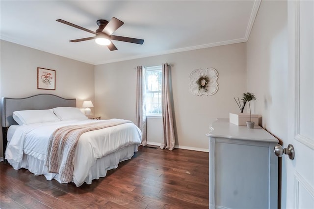 bedroom featuring dark wood-type flooring, ceiling fan, and crown molding