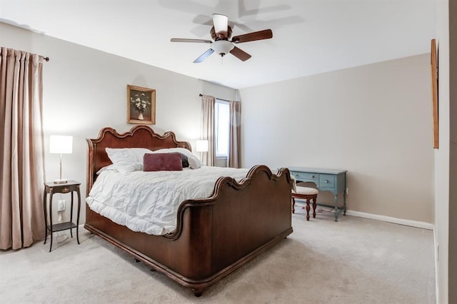 bedroom featuring light colored carpet and ceiling fan