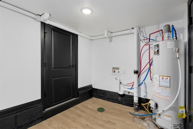 utility room with water heater