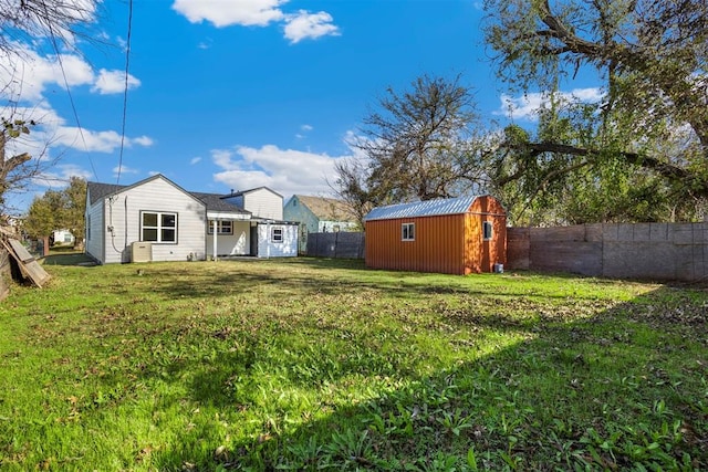 view of yard with a storage shed