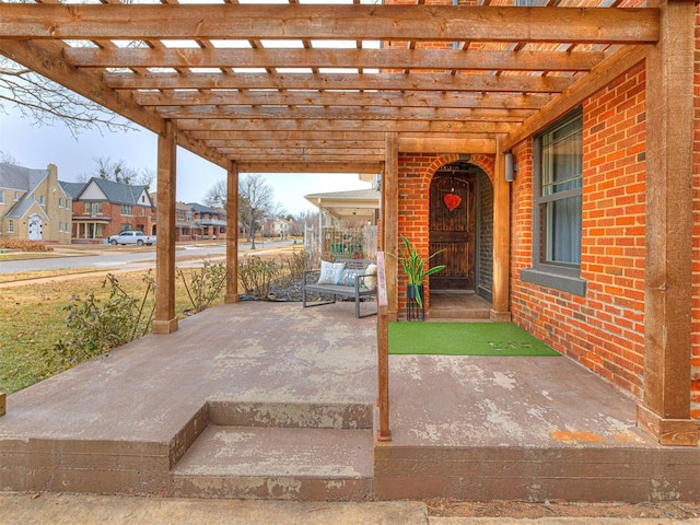 view of patio / terrace featuring a pergola