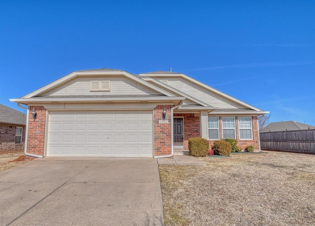 single story home with a garage