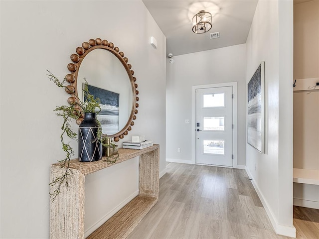 foyer entrance featuring light hardwood / wood-style flooring