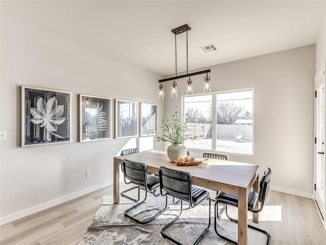 dining area featuring light hardwood / wood-style floors