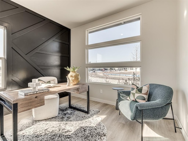 office space with light hardwood / wood-style floors