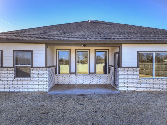 doorway to property with a patio area