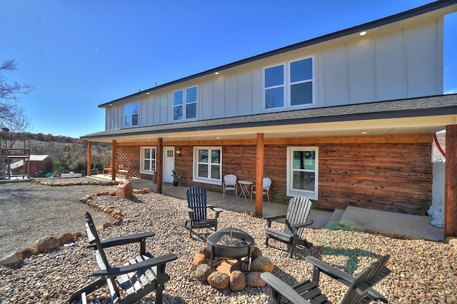 rear view of house featuring a patio