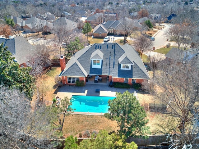 view of swimming pool featuring a fenced backyard, a fenced in pool, and a patio