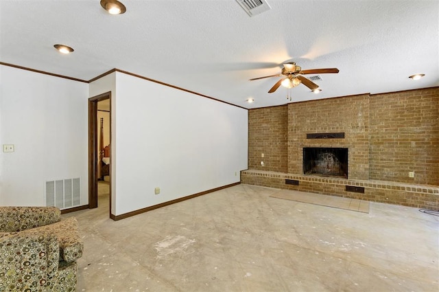 unfurnished living room featuring a brick fireplace, a textured ceiling, and ceiling fan