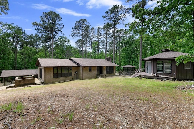 view of front of home featuring a gazebo