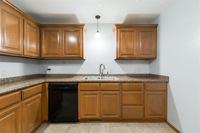 kitchen with sink, hanging light fixtures, light tile patterned floors, and dishwasher