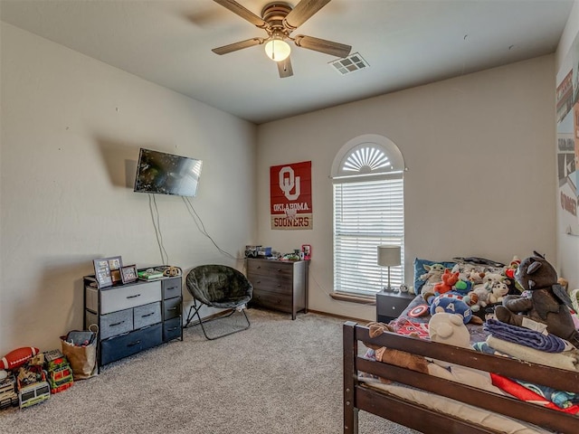 carpeted bedroom featuring ceiling fan