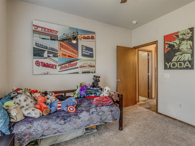 carpeted bedroom featuring ceiling fan