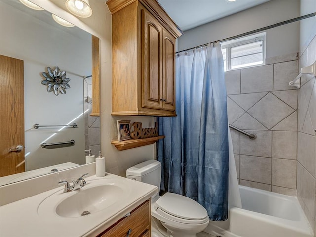 full bathroom with vanity, toilet, and shower / tub combo