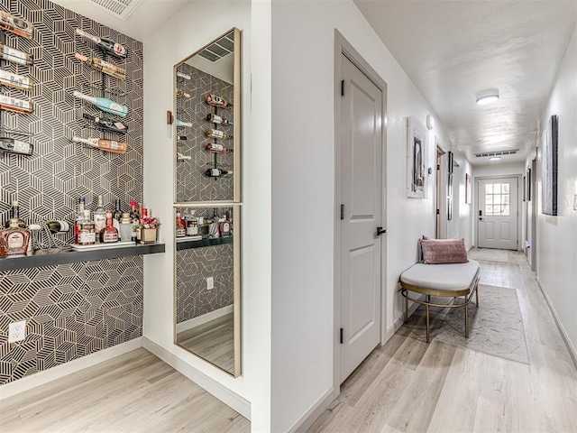 hall featuring light hardwood / wood-style flooring