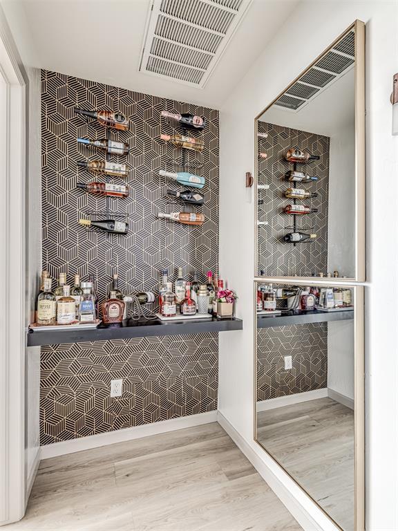 wine room featuring hardwood / wood-style floors