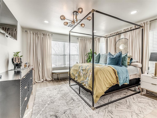 bedroom featuring hardwood / wood-style flooring