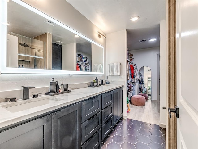 bathroom featuring vanity and tile patterned floors