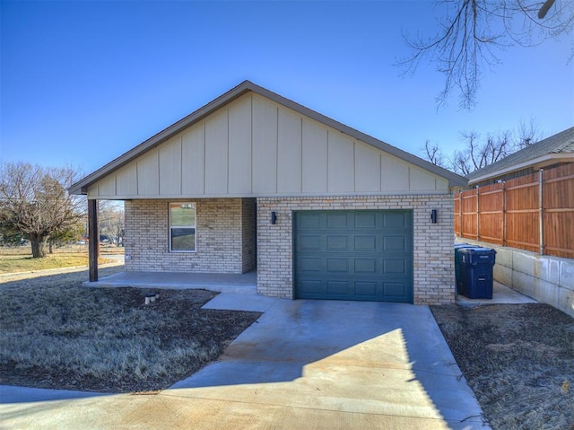 view of front of home featuring a garage and a porch