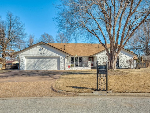 ranch-style home with a garage