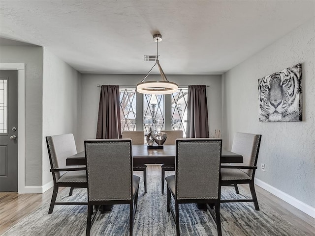 dining room featuring hardwood / wood-style floors