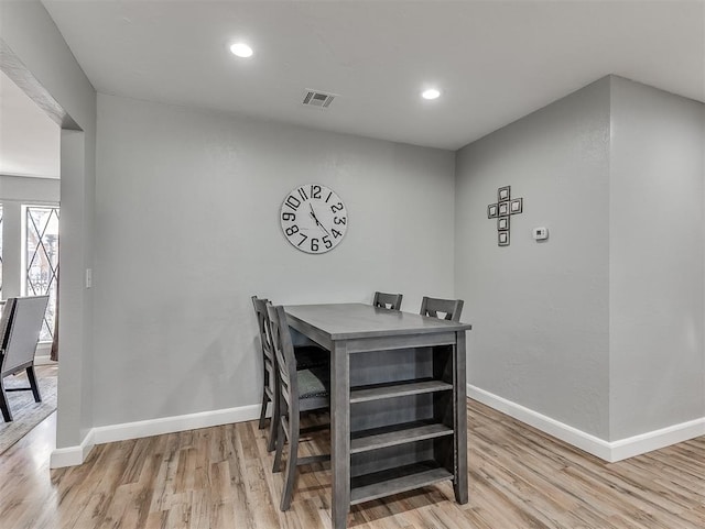 dining room featuring light hardwood / wood-style flooring