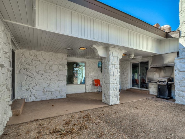 exterior space with ceiling fan and a grill