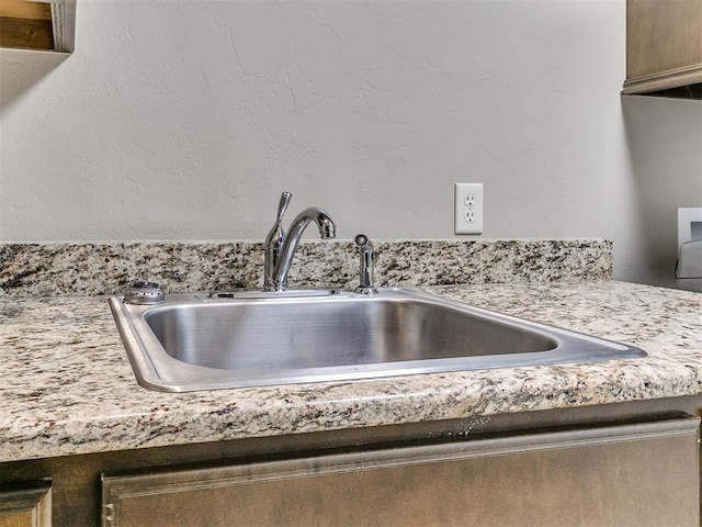 details with light countertops and a sink