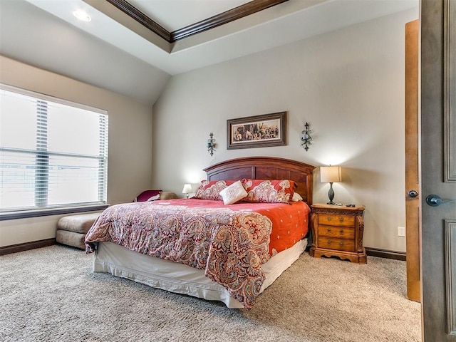 bedroom with vaulted ceiling, ornamental molding, carpet, and baseboards