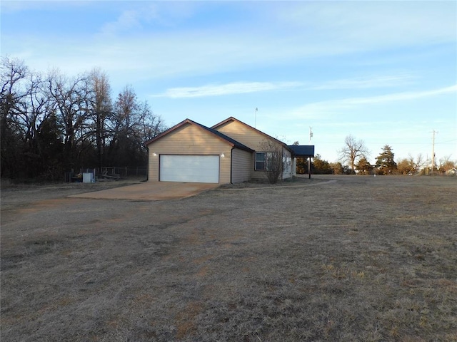 view of property exterior featuring a garage