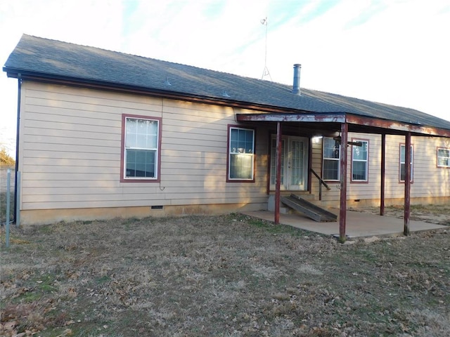 rear view of house with a patio