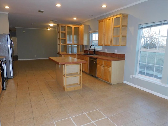 kitchen featuring range, dishwasher, a kitchen island, sink, and ornamental molding